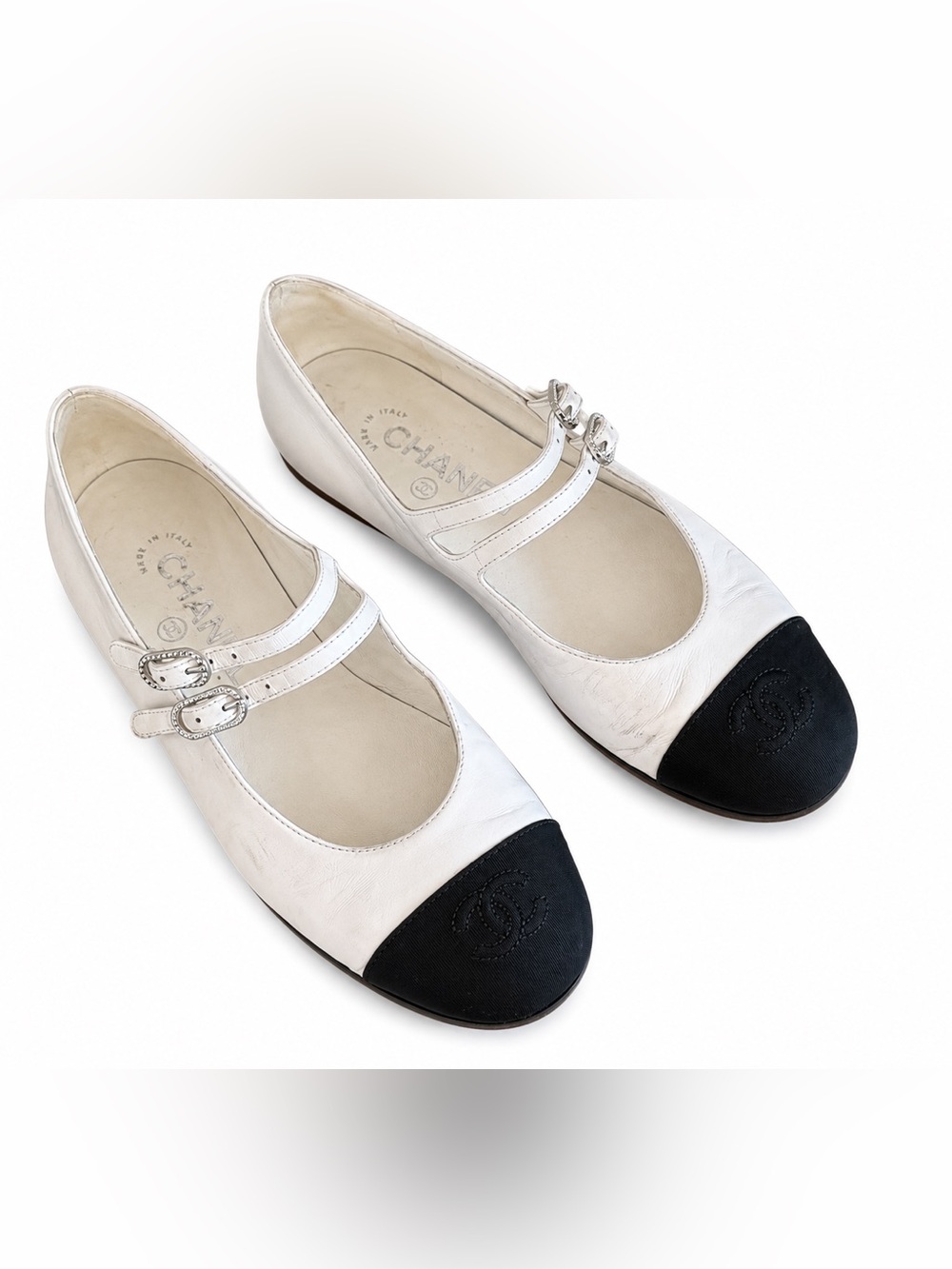 CHANEL White Leather Mary Jane Flats with Black Cap Toe and Double Straps